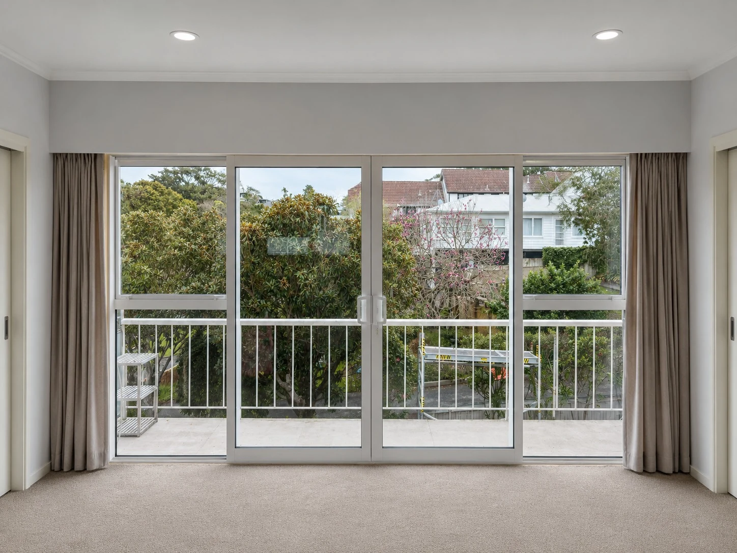 After replacement: upgraded aluminium glazed sliding door arrangement